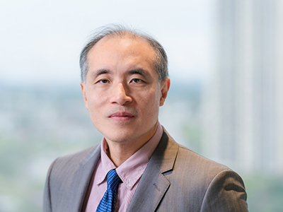 Headshot of Terence Chan, Chief Financial Officer, RECO